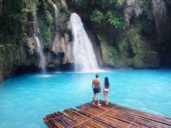 Photo of couple at waterfall, just like you on your Hawaii Honeymoon