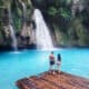 Photo of couple at waterfall, just like you on your Hawaii Honeymoon