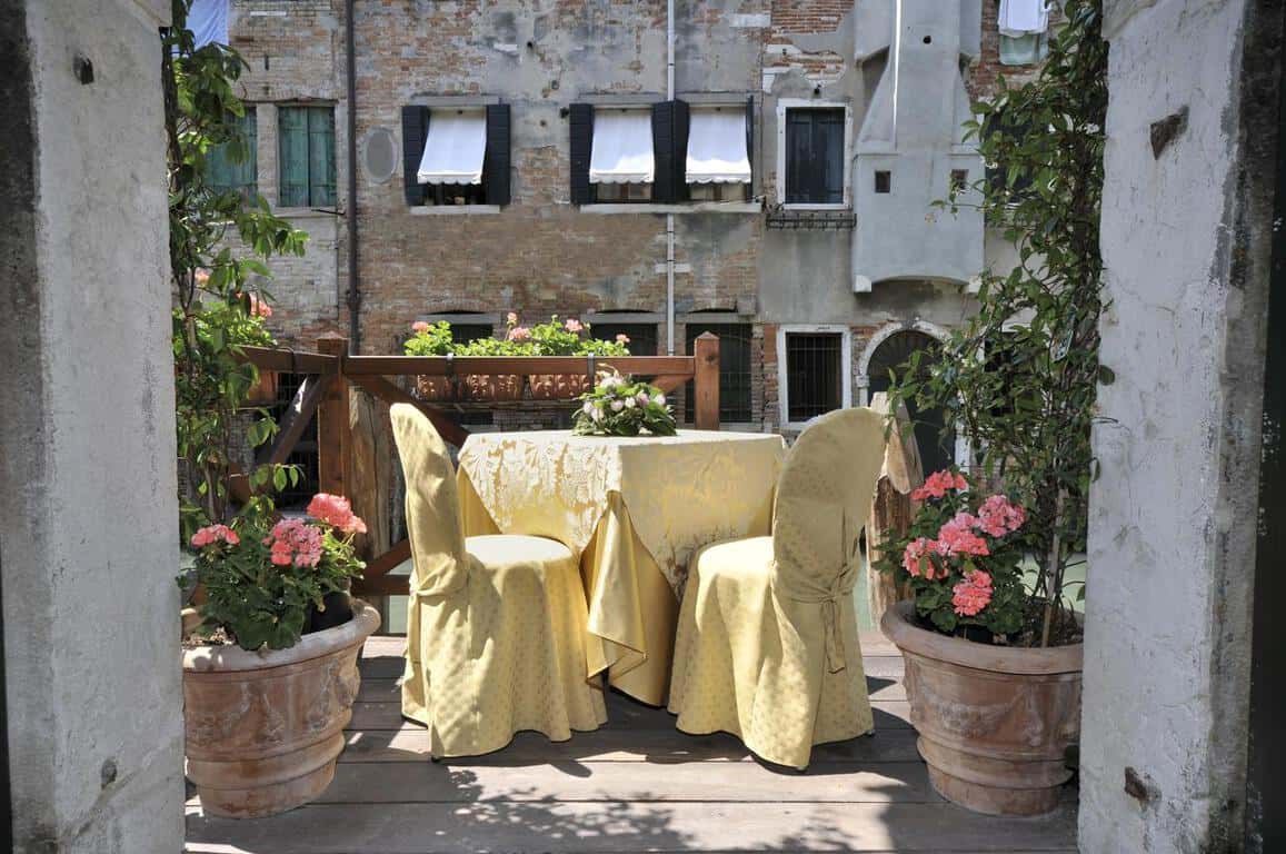 A patio of the lovely Alla Vite Dorata, a great choice of where to stay in Venice