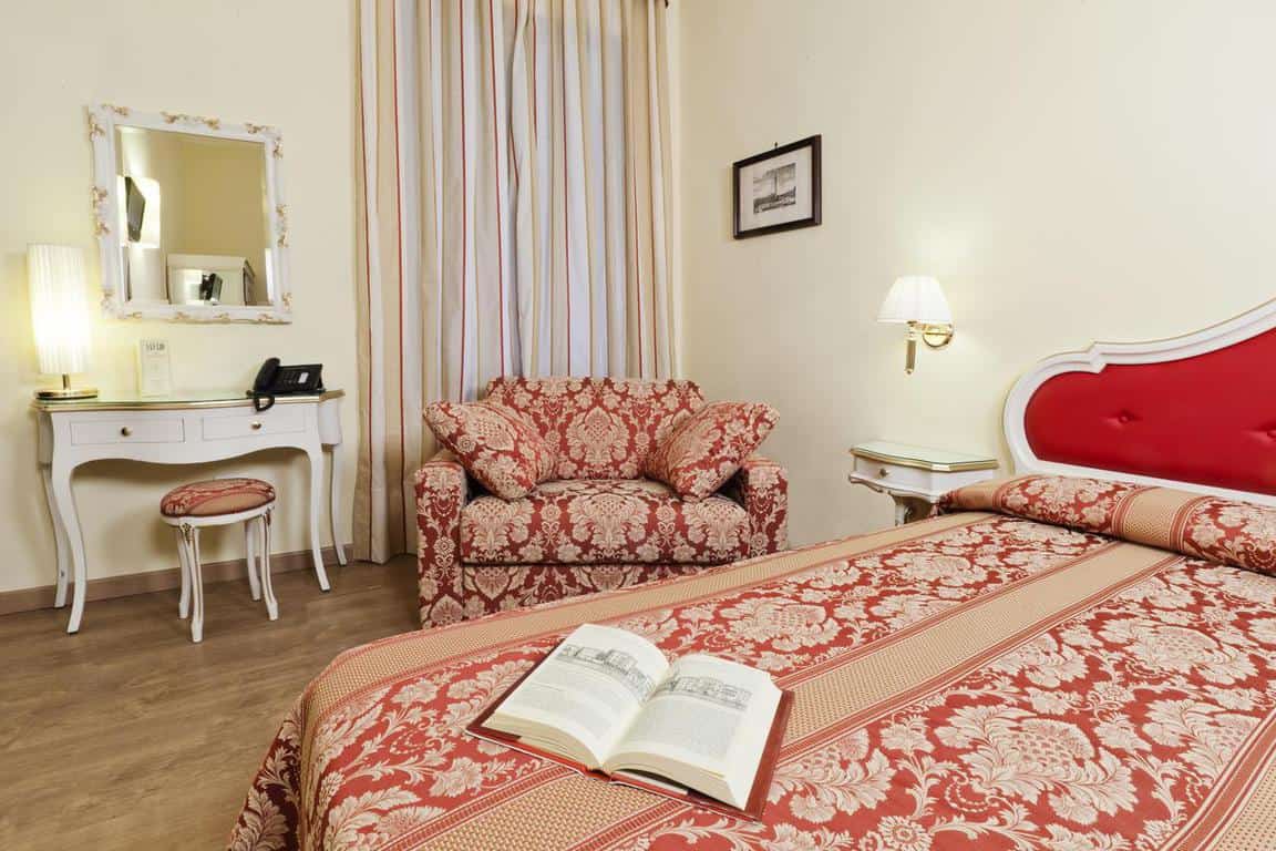 A charming room in San Lio Tourist Home, a great choice of where to stay in Venice