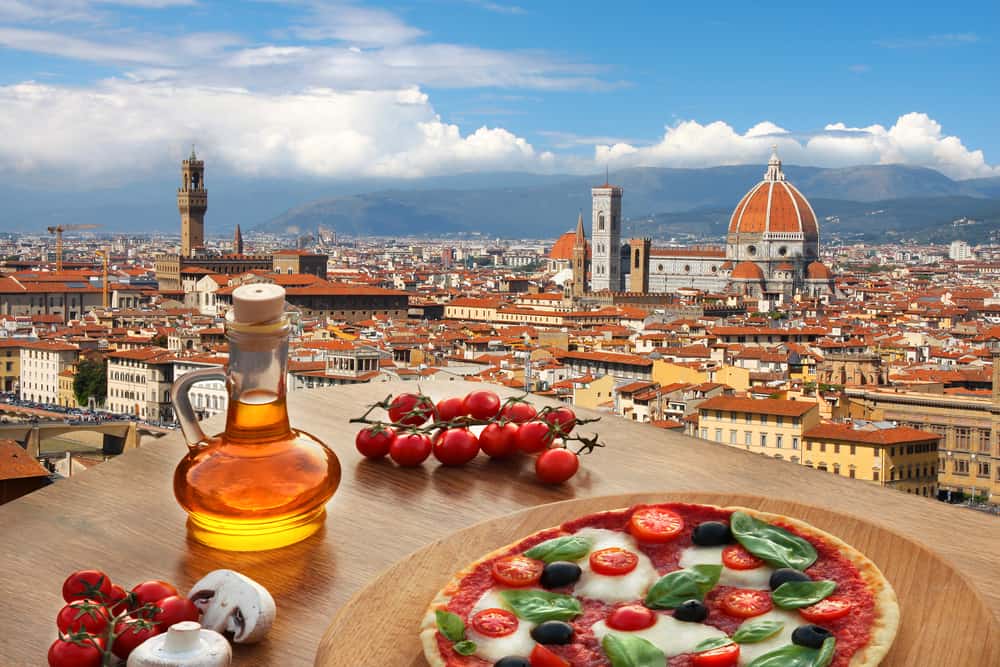 table with food looking out onto florence 