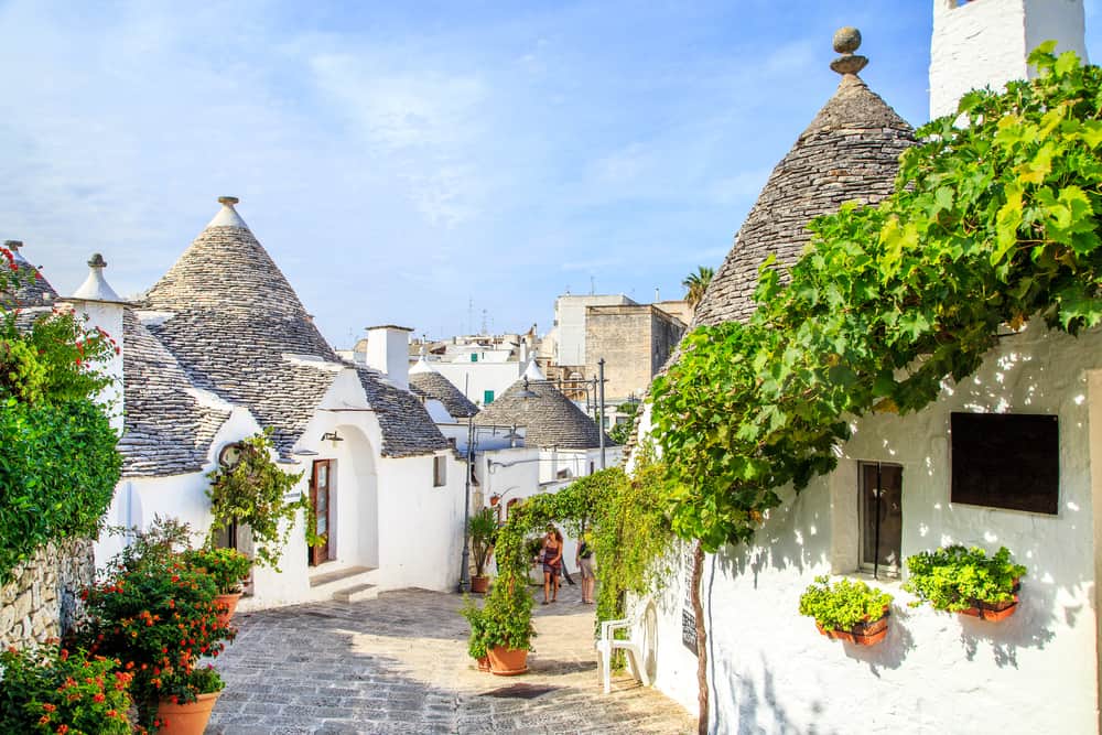 small town in italy with whit conical buildings