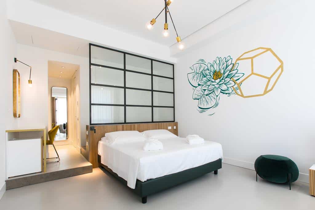 Modern and minimalist room with a wall mural.