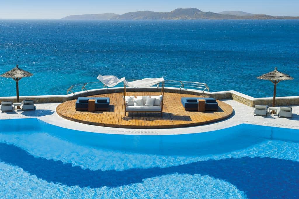Photo of pool and sea at Mykonos Grand Hotel & Resort, a great Greece honeymoon location.