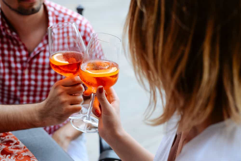 Photo of couple with some sparkling drinks.