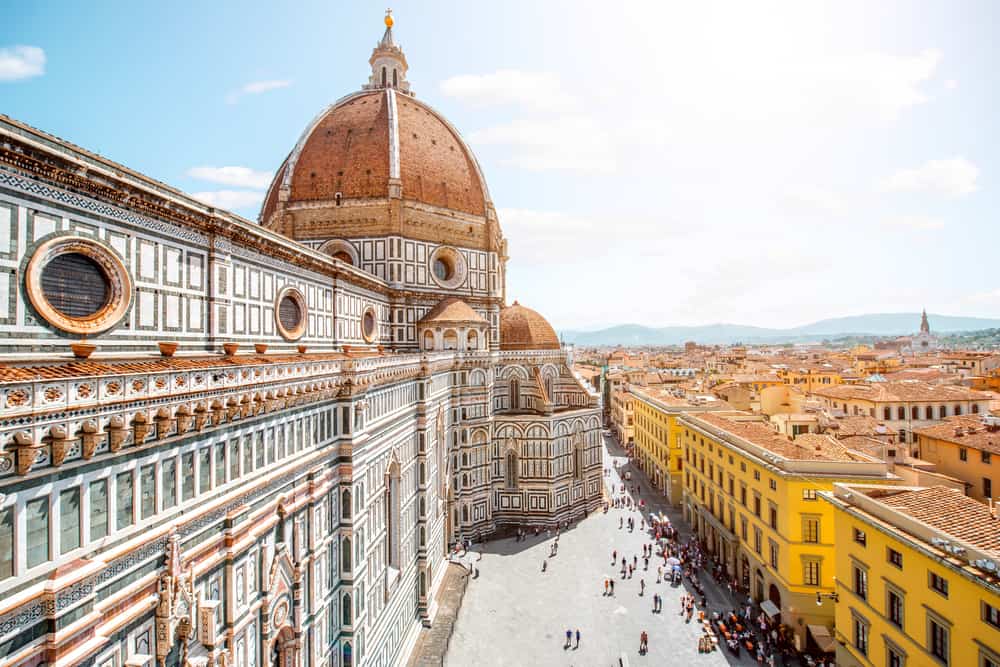 Photo of historic church in Florence, the biggest city when considering where to stay in Tuscany.