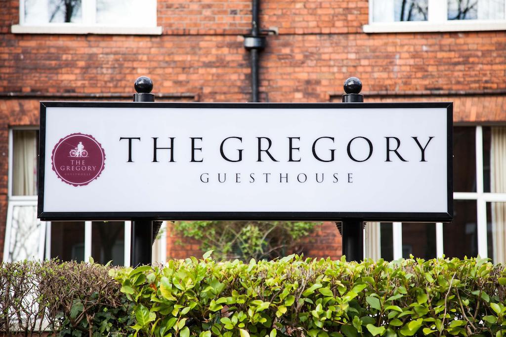 Photo of the welcome sign for the Gregory Guesthouses, a fun place to stay during your Ireland honeymoon.