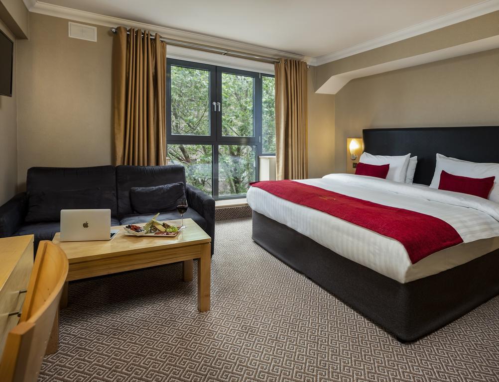 Relax in the comfortable rooms at Academy Plaza