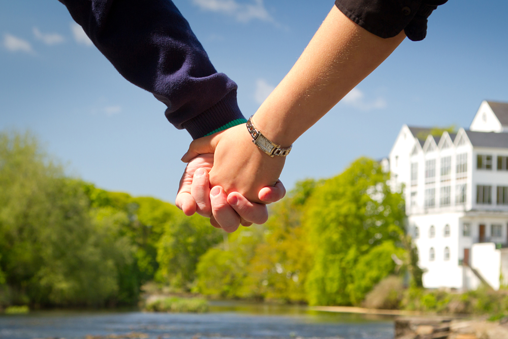 Photo of couple holding hands in Ireland.