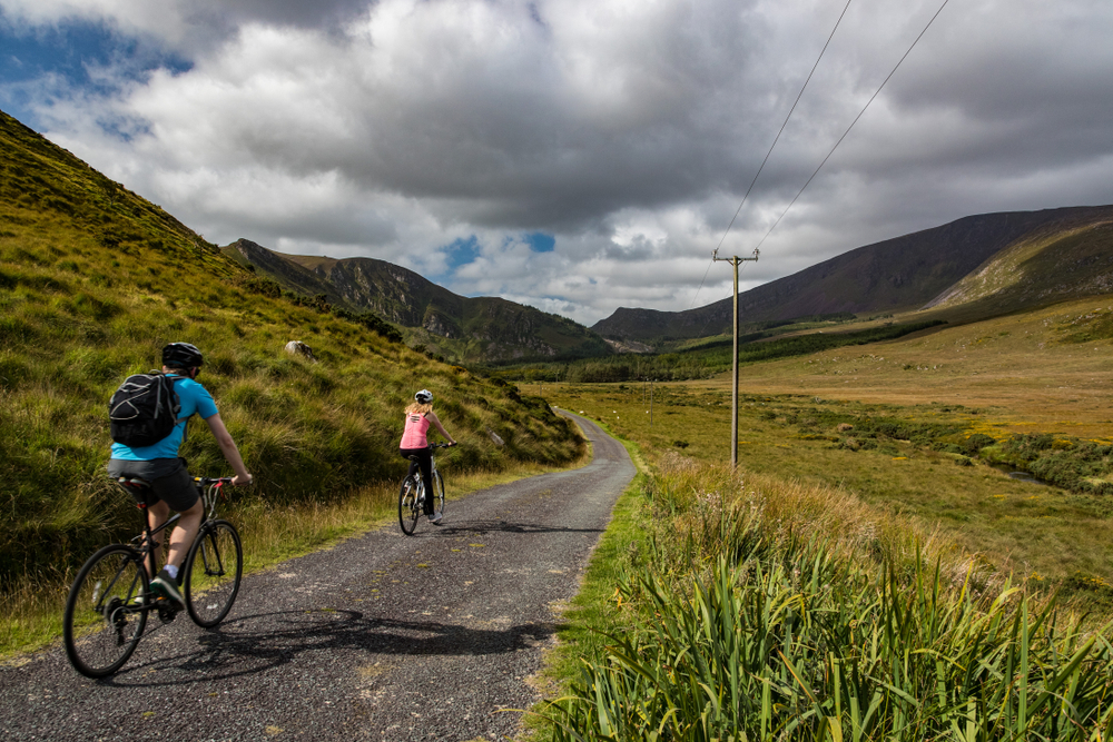 Photo of couple riding bikes in Ireland.