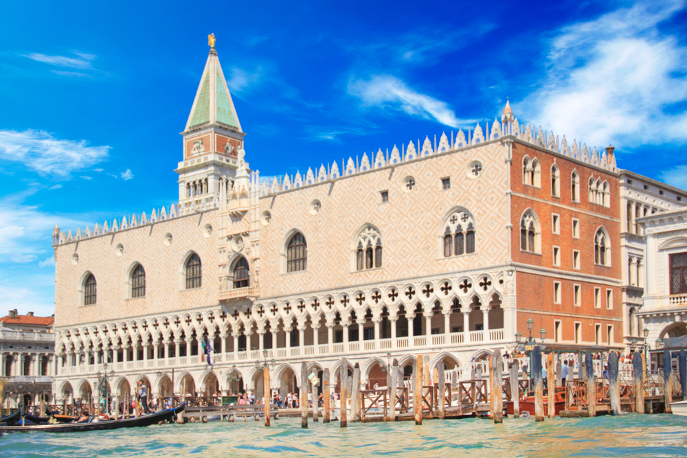 Beautiful, pink Doge's Palace seen from across the water.