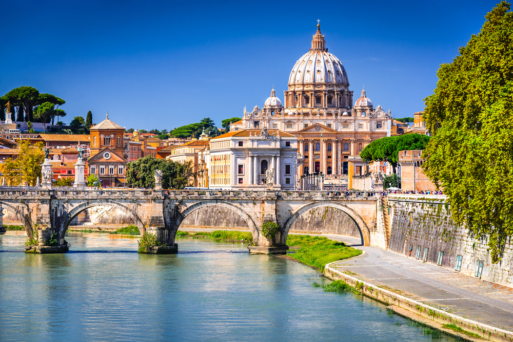 View across the river to Saint Peter's Basilica in the Vatican City in Rome, Italy.