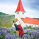 Photo of Victoria and Terrence in front of church in Iceland.