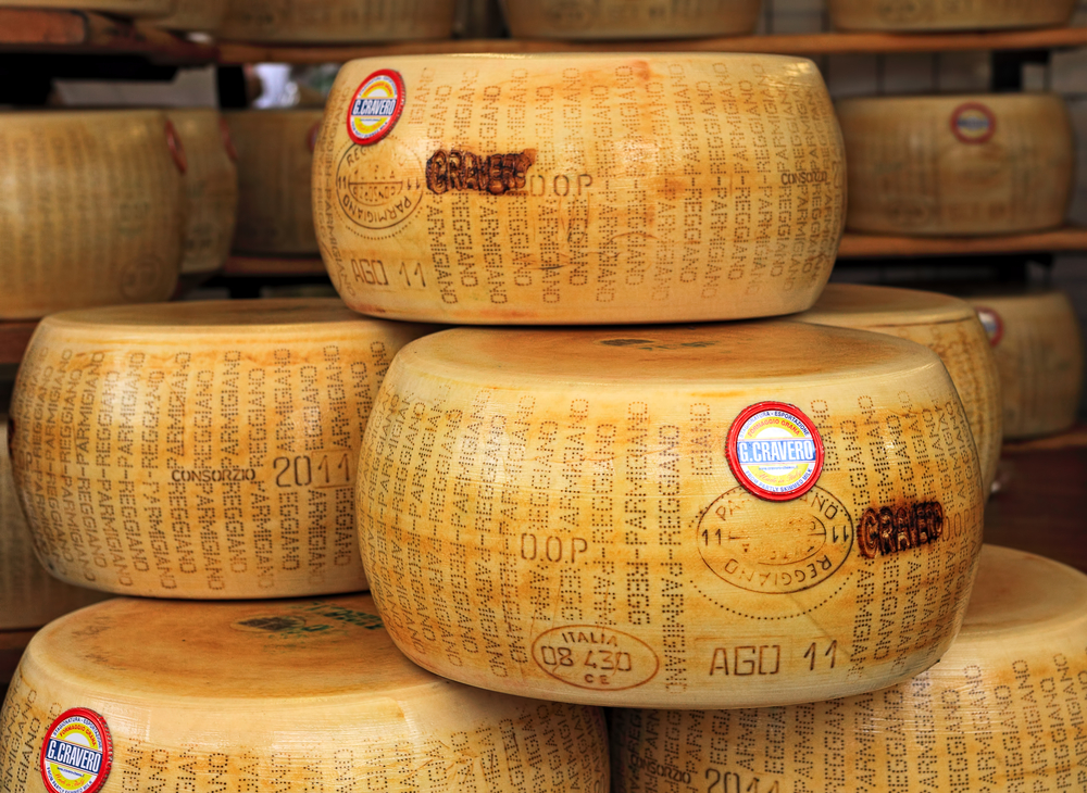 wheels of Parmesan cheese Northern Italy itinerary