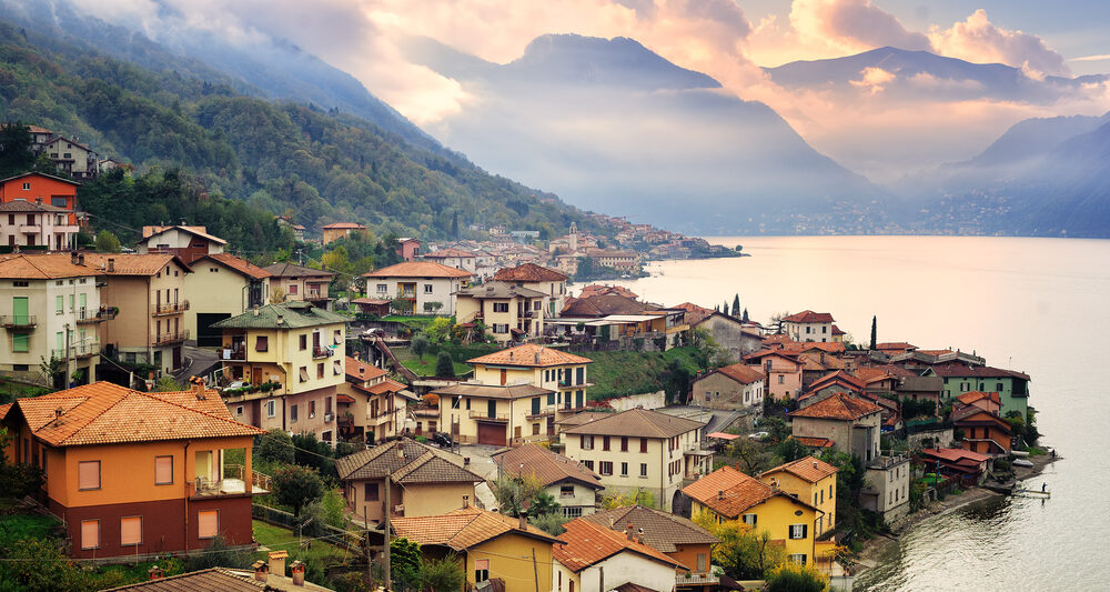 picturesque Lake Como houses on lake during sunrise