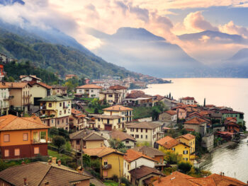picturesque Lake Como houses on lake during sunrise
