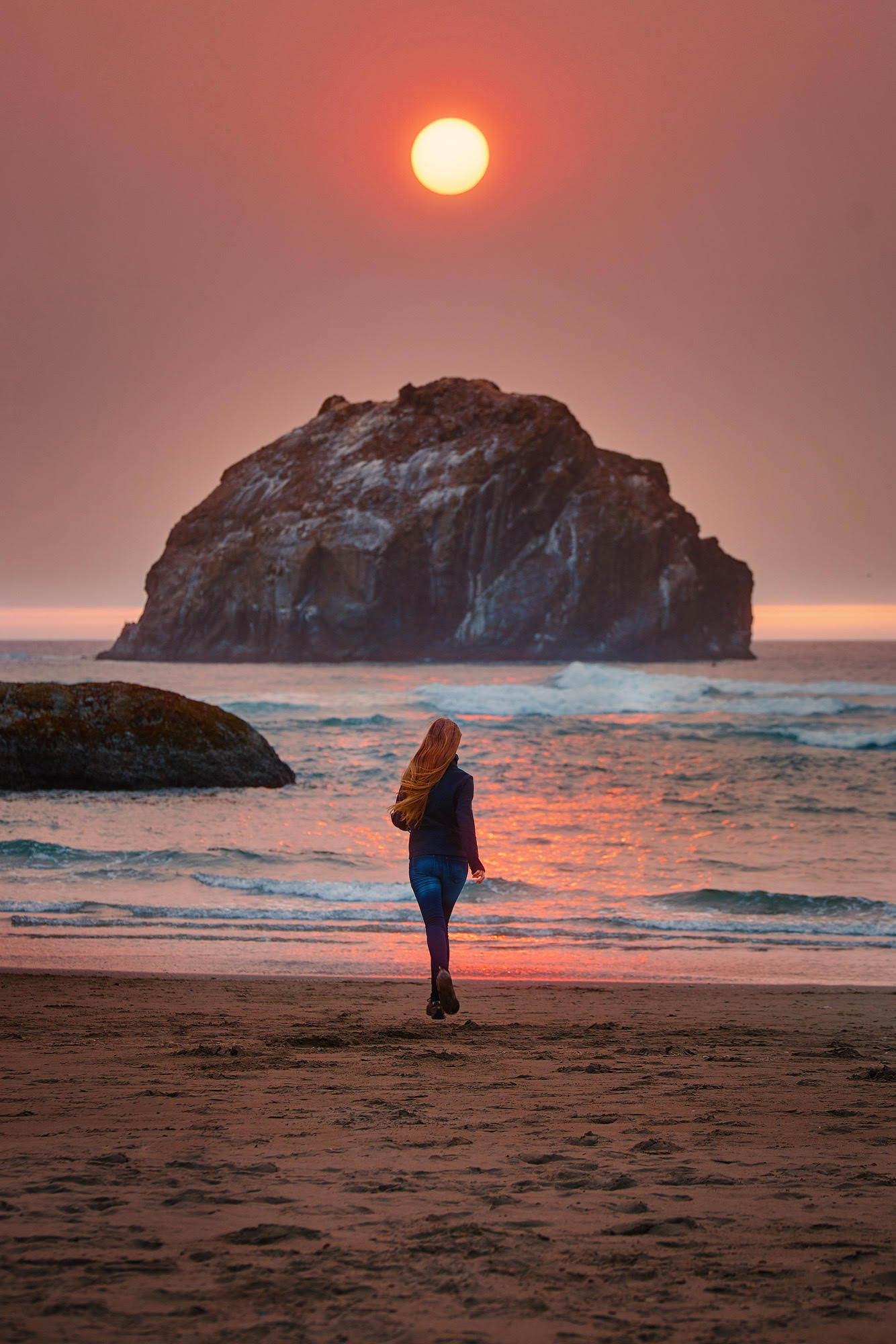 running on the beach in Bandon on your Oregon coast road trip