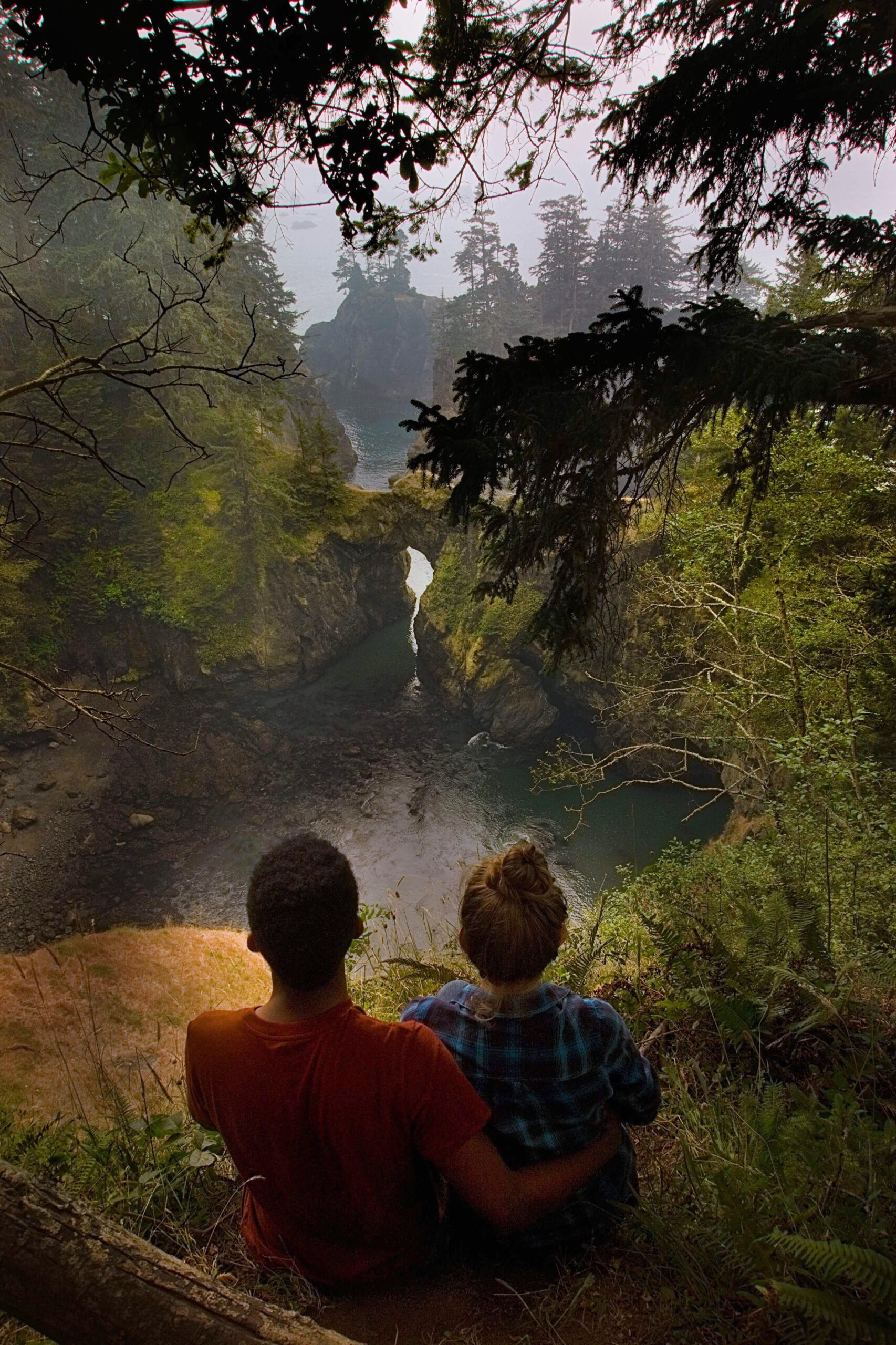 sitting on a ledge at the Samuel H Boardman Scenic Corridor on your Oregon coast road trip