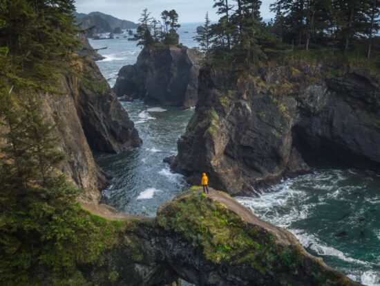 walking on a natural bridge at the Samuel H Boardman Scenic Corridor on your Oregon coast road trip