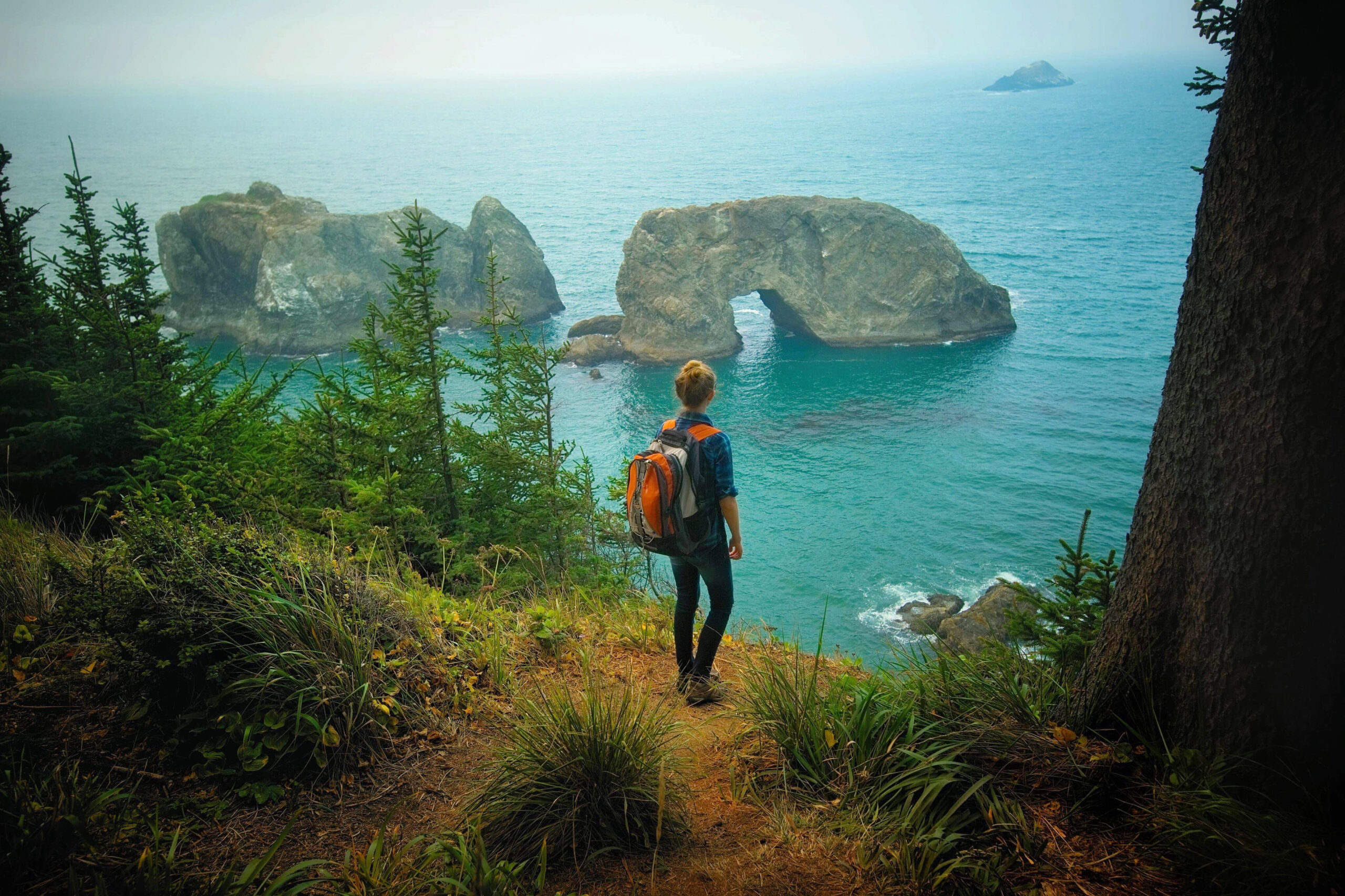 hiking with a backpack on your Oregon coast road trip