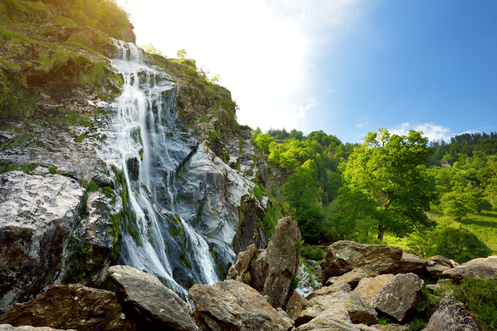 waterfall flowering over rocks day trips from Dublin