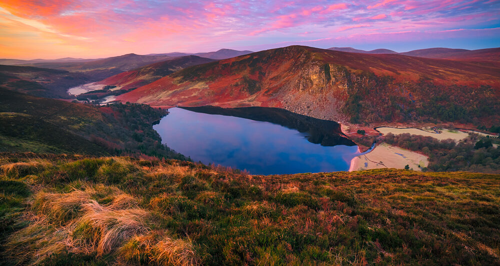 Wicklow mountains and lake during colorful sunset