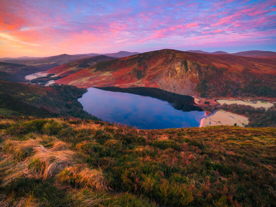 Wicklow mountains and lake during colorful sunset