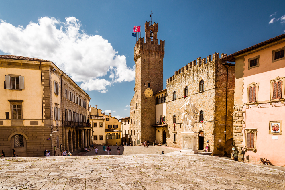 empty, medieval square in Italy Day trips from Florence