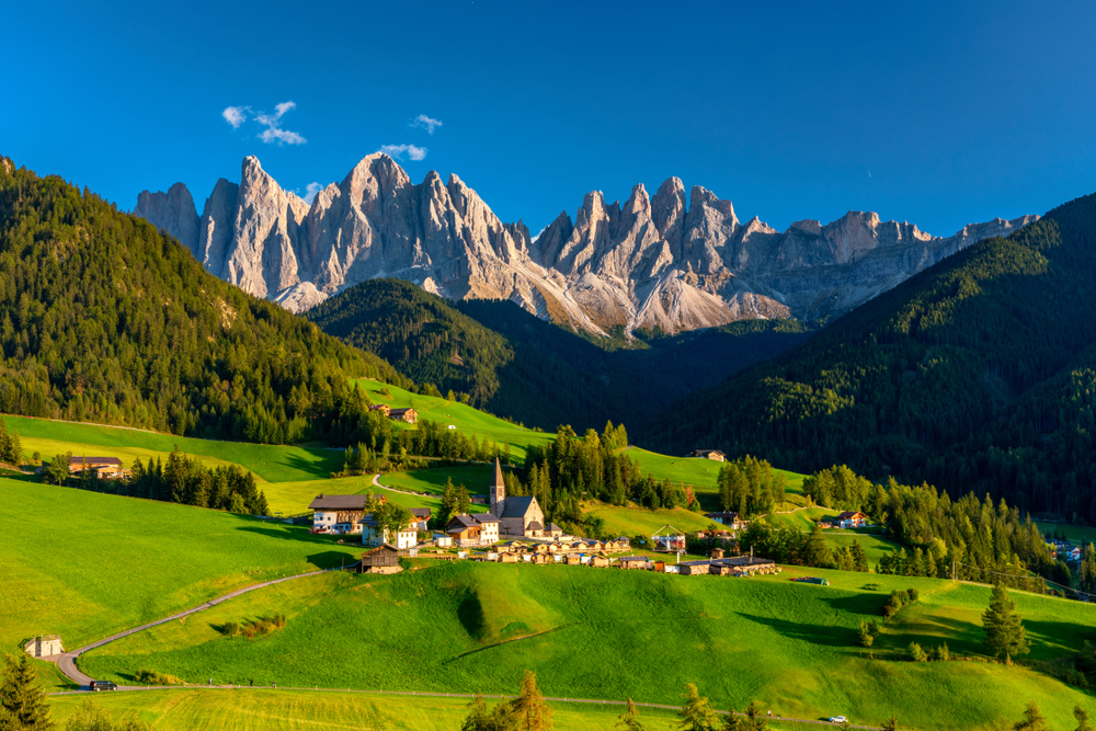 Church Of Santa Magdalena with Italian Alps jutting up in the background.