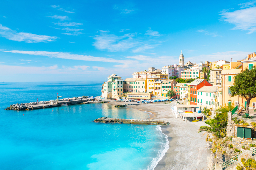 Aerial view of Bogliasco's beach and colorful buildings.