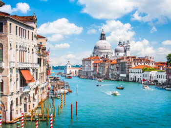 A view of The Grand Canal with its teal waters and busy boat activity.