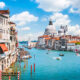 A view of The Grand Canal with its teal waters and busy boat activity.