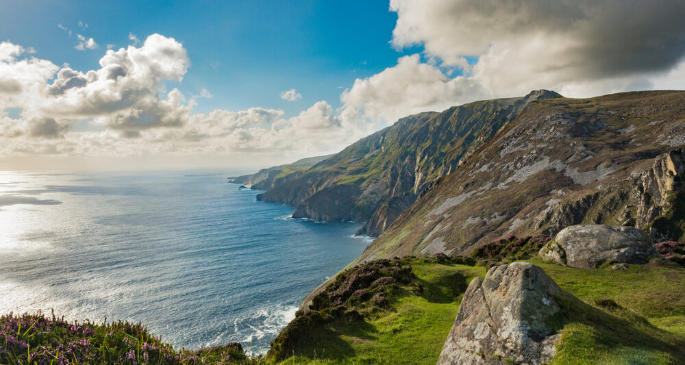 The Slieve League Cliffs jutting out of the sea beneath.
