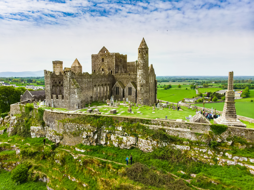 The Rock of Cashel seen from across a pasture.