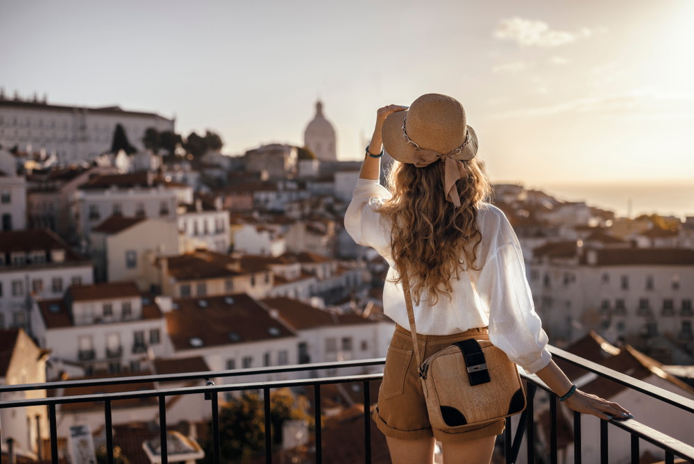 Photo of a woman in Italy, like you will be after you figure out your trip to Italy cost.