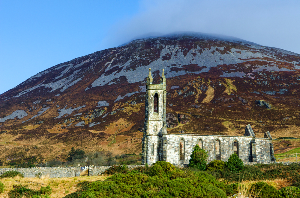 The shell of the church at Dunlewey Ruins with Mount Errigal in the background