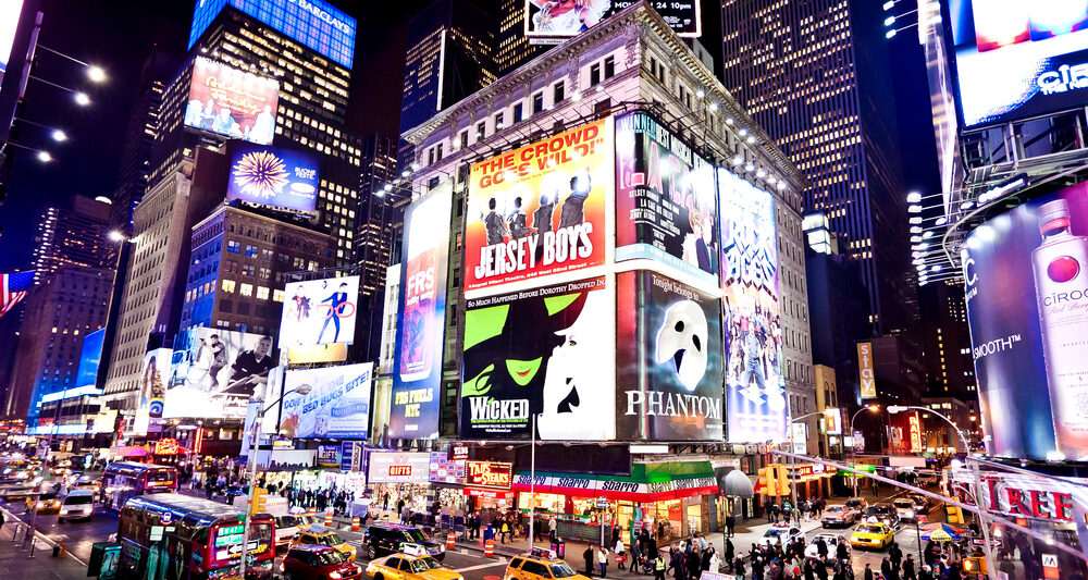 Times Square at night during your 4 days in New York