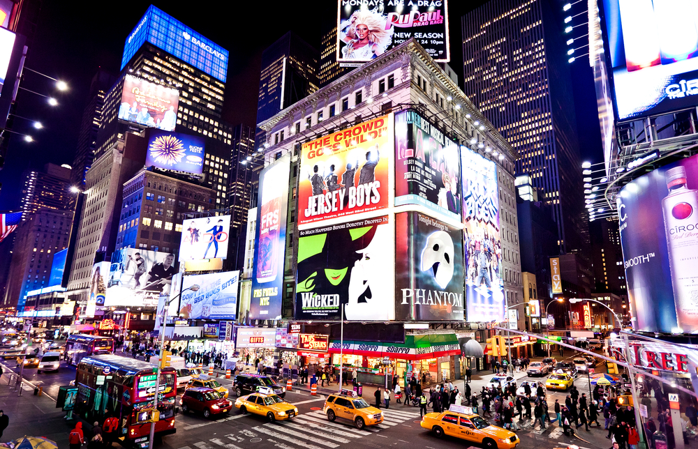 Times Square at night during your 4 days in New York