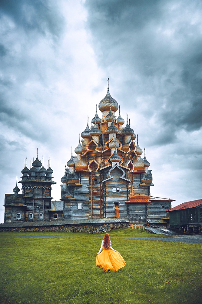 Hidden Gems in Europe Kizhi Island church with girl in front