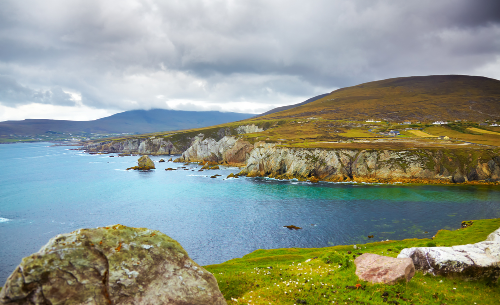 Wide view of Achill Islands with rugged cliffs and the ocean.