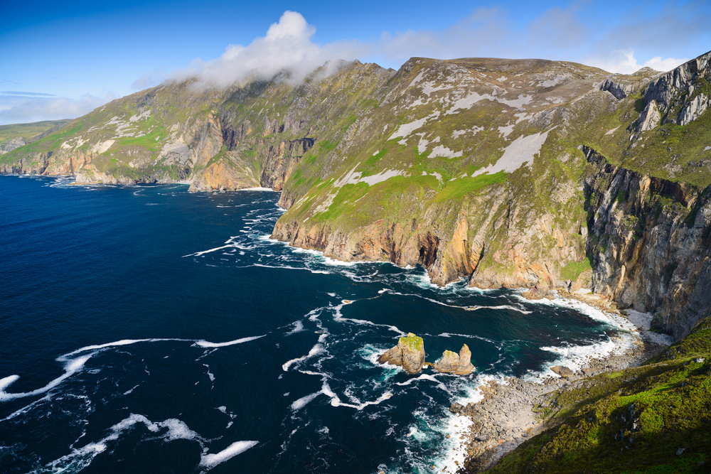 View looking down at Slieve League Cliff with beautiful ocean water.