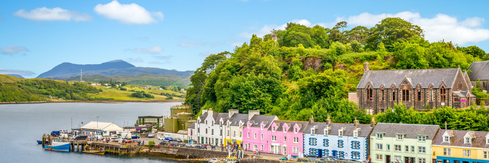 View of the colorful harbor of Portree