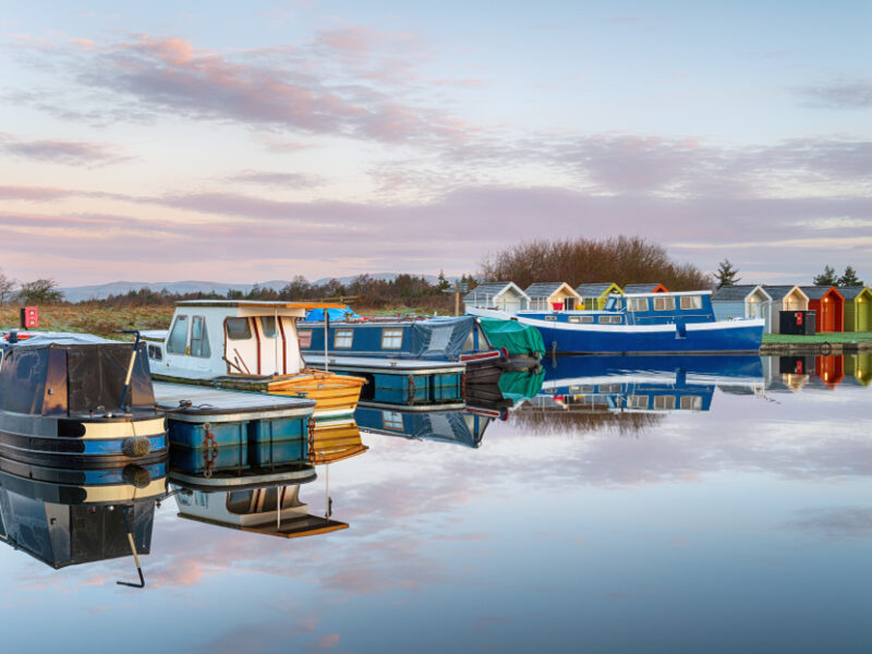 Colorful boats on the channel in Falkirk, one of the most charming towns in Scotland 