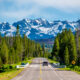 Photo of car driving in Yellowstone.