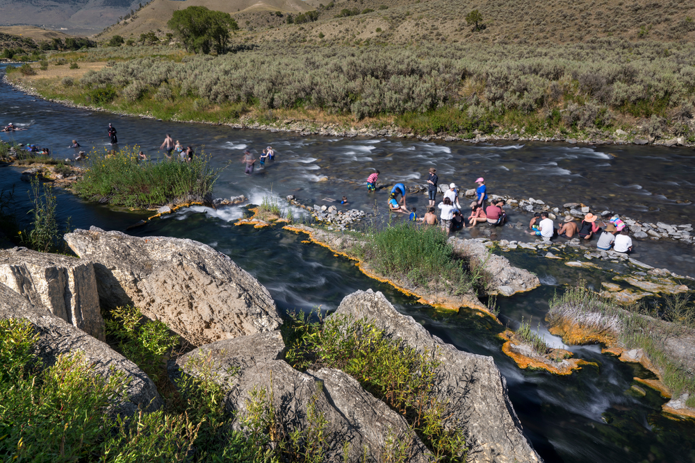 Photo of Boiling River, one of the few hot springs in Yellowstone you can actually bathe in during your Yellowstone road trip.