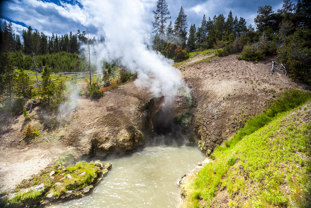 Photo of Mud Volcano, a great stop on your Yellowstone road trip!