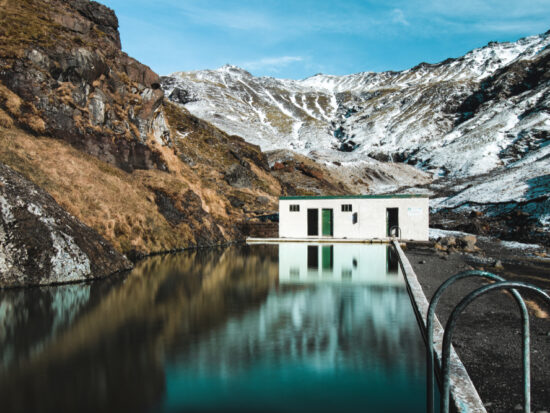 the Seljavallalaug swimming pool during your trip to Iceland in October