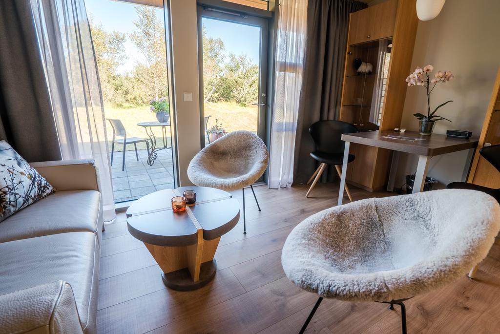 Photo of seating area in guest room at Hotel Husafell located in Iceland