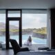 Photo of guest room at the Retreat at Blue Lagoon located in Iceland. One of the unique luxury hotels in Iceland surrounded by a lagoon.