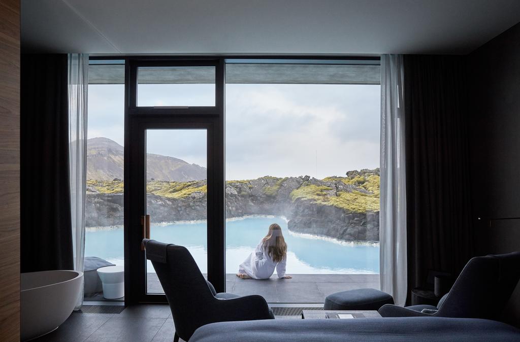 Photo of guest room at the Retreat at Blue Lagoon located in Iceland. One of the unique luxury hotels in Iceland surrounded by a lagoon. 